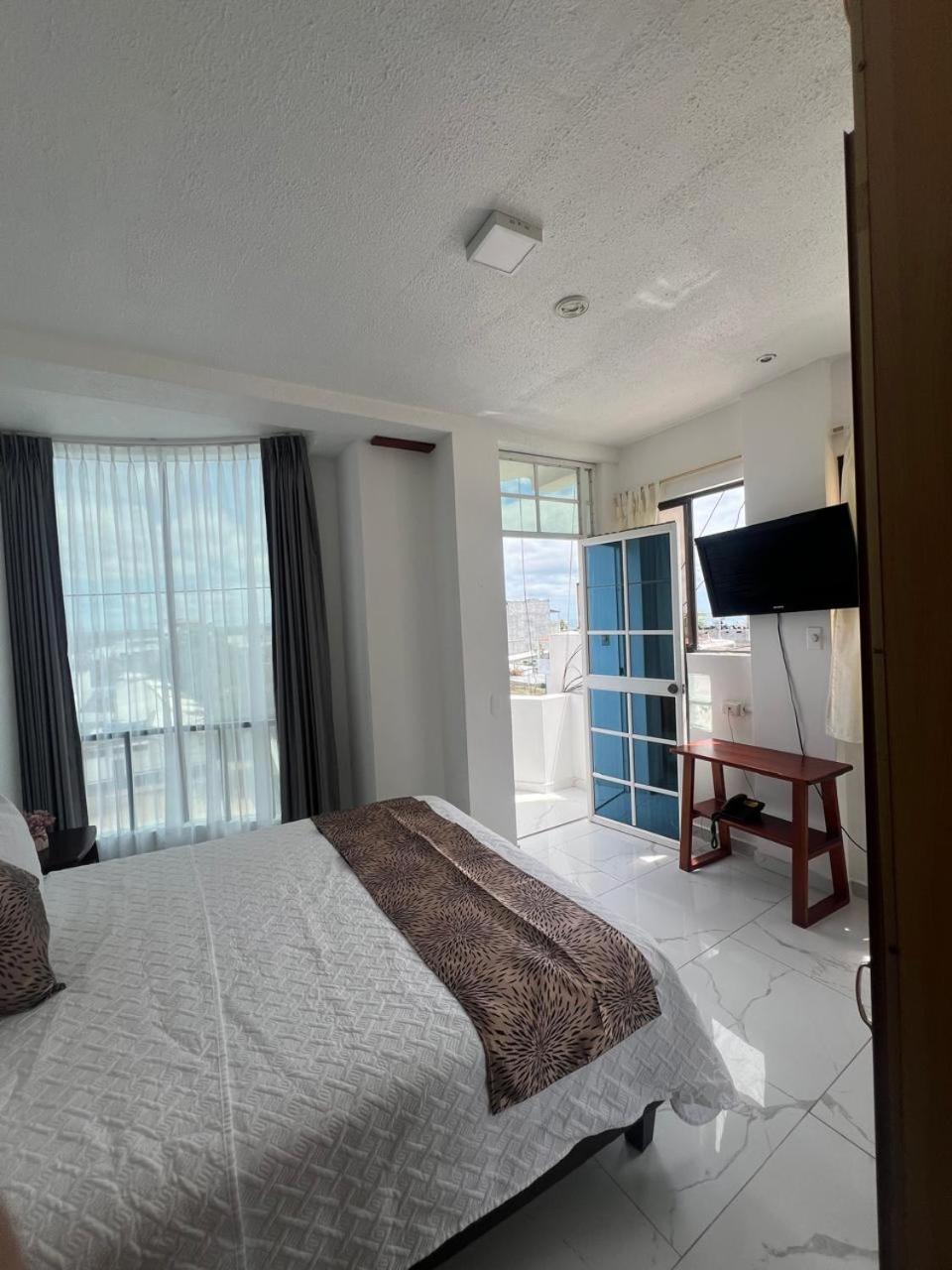 פורטו איורה Hostal Carliza מראה חיצוני תמונה